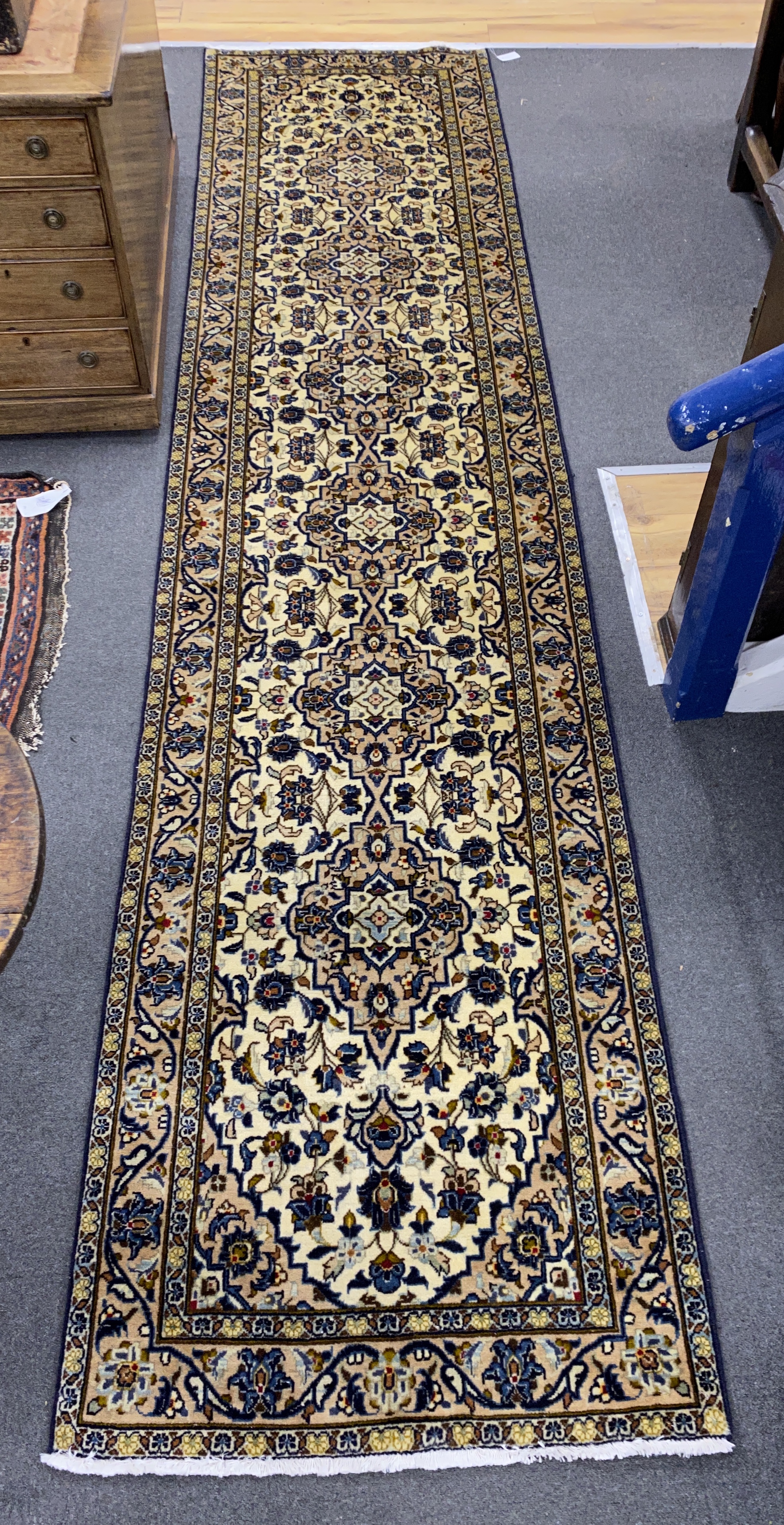 A North West Persian ivory ground runner, 400 x90cm